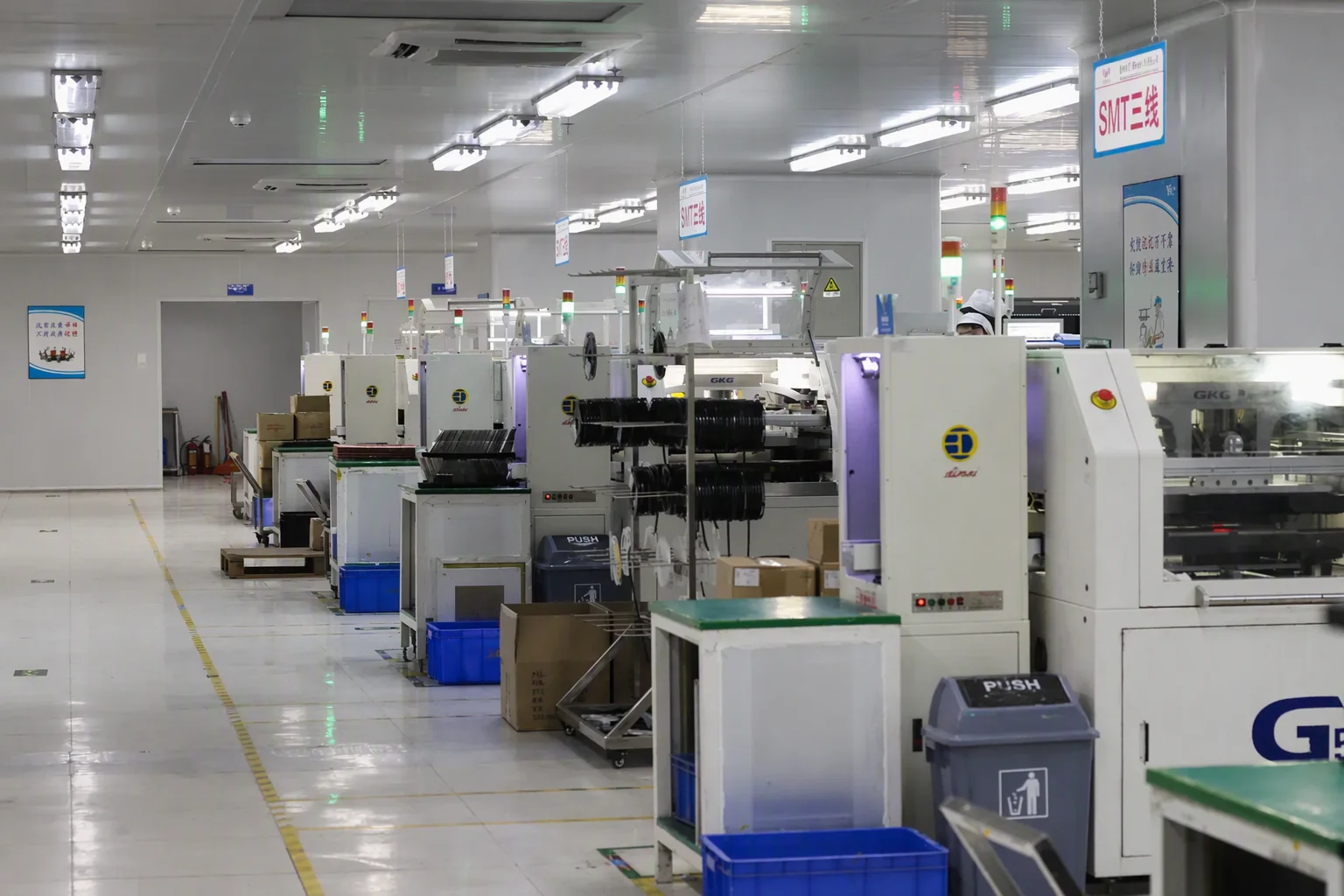 Advanced PCB manufacturing factory floor with SMT production lines